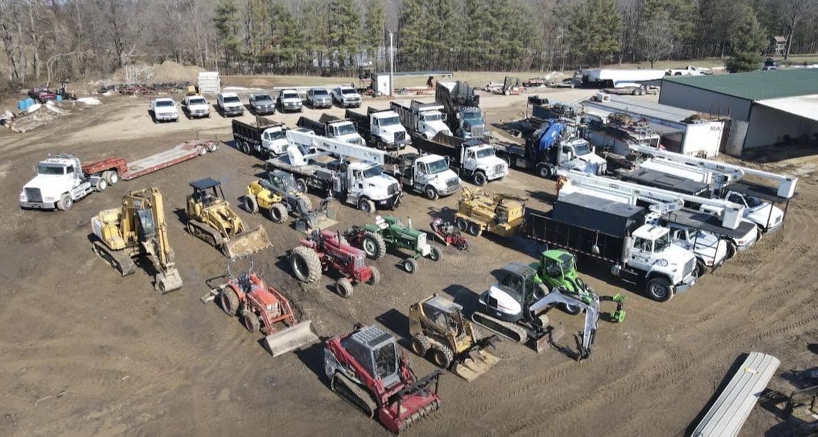 Aerial view of the Tree Pros truck and equipment fleet